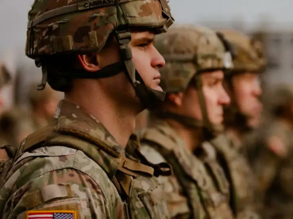 National Guard breaks up college protest by throwing enlistment flyers at crowd