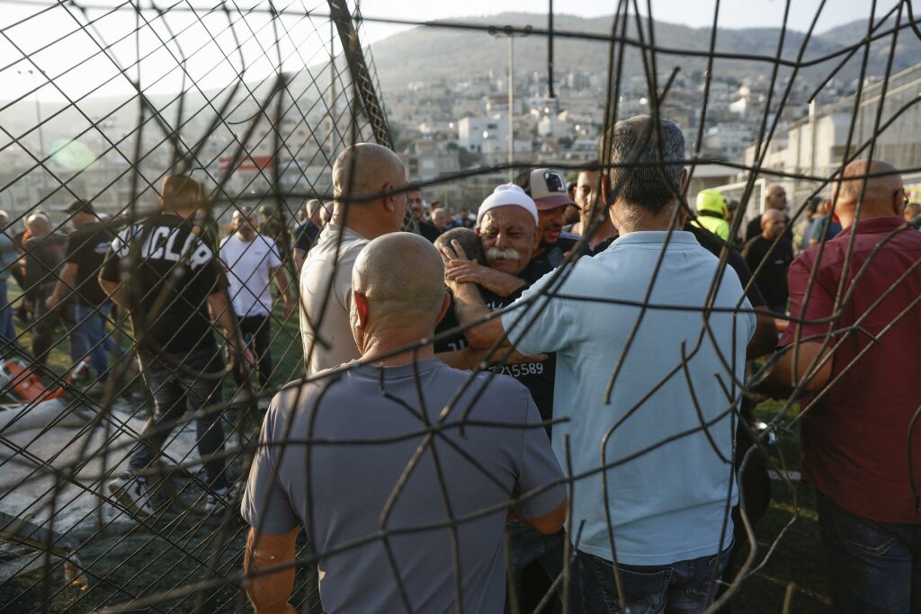 Israel Weighs Response to Hezbollah After a Rocket from Lebanon Kills 12 Youths on a Soccer Field