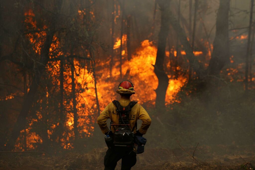 Firefighters continue battling massive wildfire in California ahead of thunderstorms, lightning