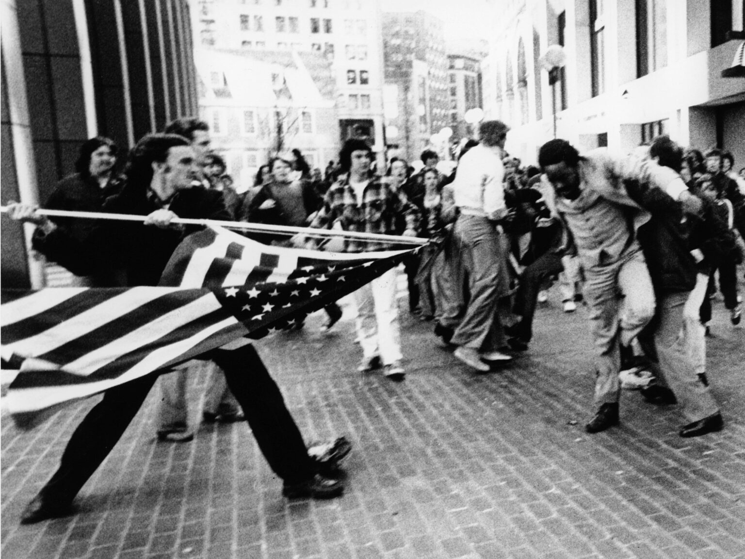 Marine Corps Veteran Who Breached Capitol During Riot with Flag Painted on Head Gets Probation